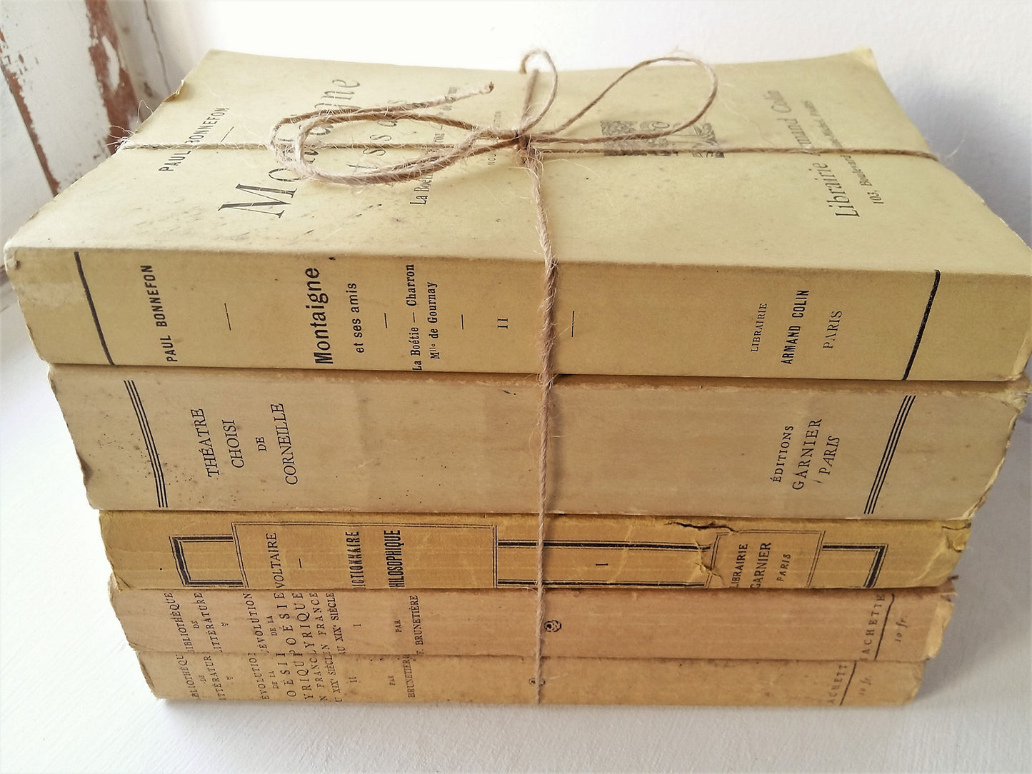 Vanilla/Yellow Stack of Famous French Literature by Voltaire, Corneille and Montaigne. from Tiggy & Pip - Just €139! Shop now at Tiggy and Pip