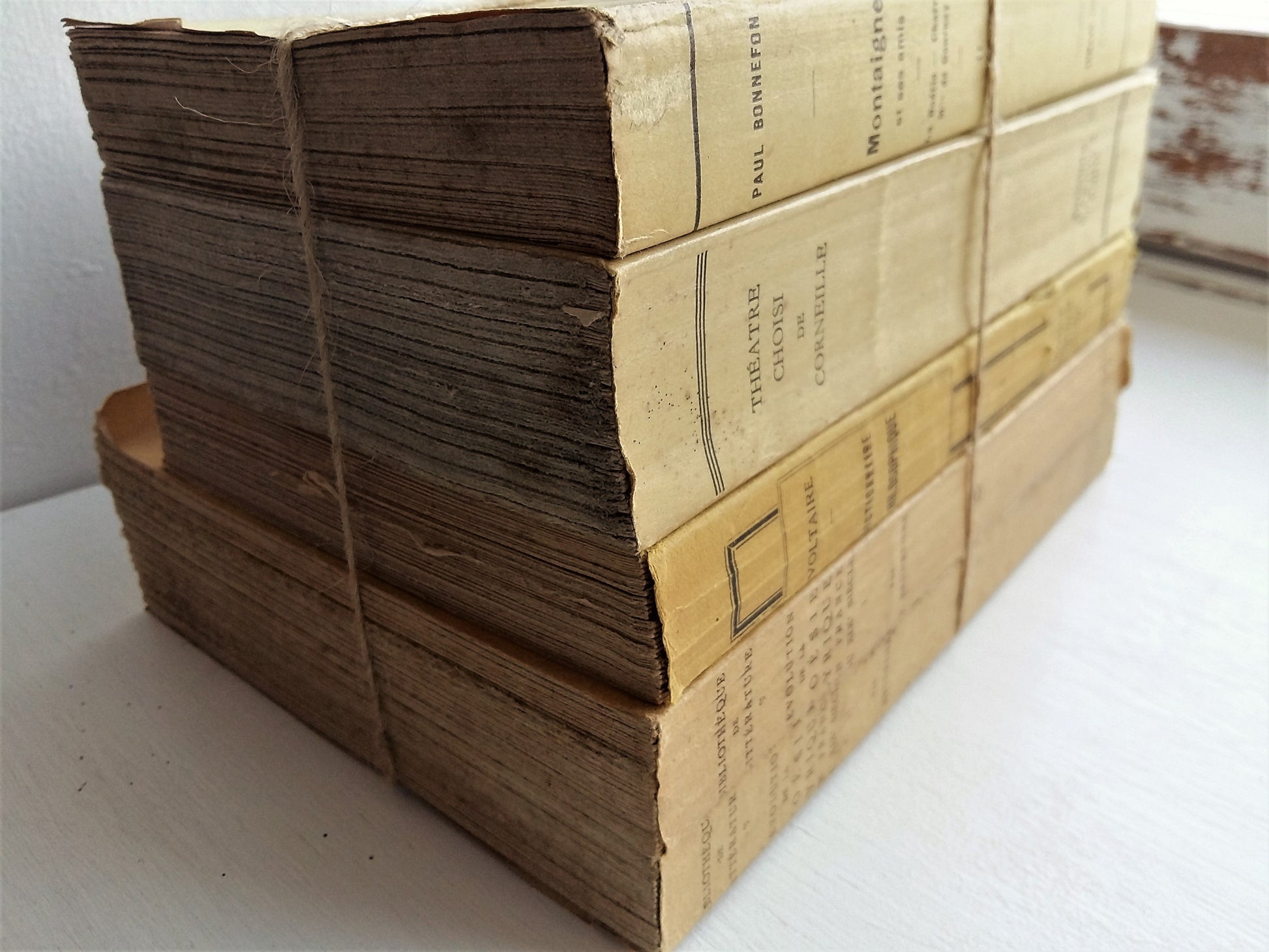 Vanilla/Yellow Stack of Famous French Literature by Voltaire, Corneille and Montaigne. from Tiggy & Pip - Just €139! Shop now at Tiggy and Pip