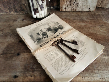 Set of 50+ 1800s Book Pages and Three Antique Iron Keys. from Tiggy & Pip - Just €58! Shop now at Tiggy and Pip
