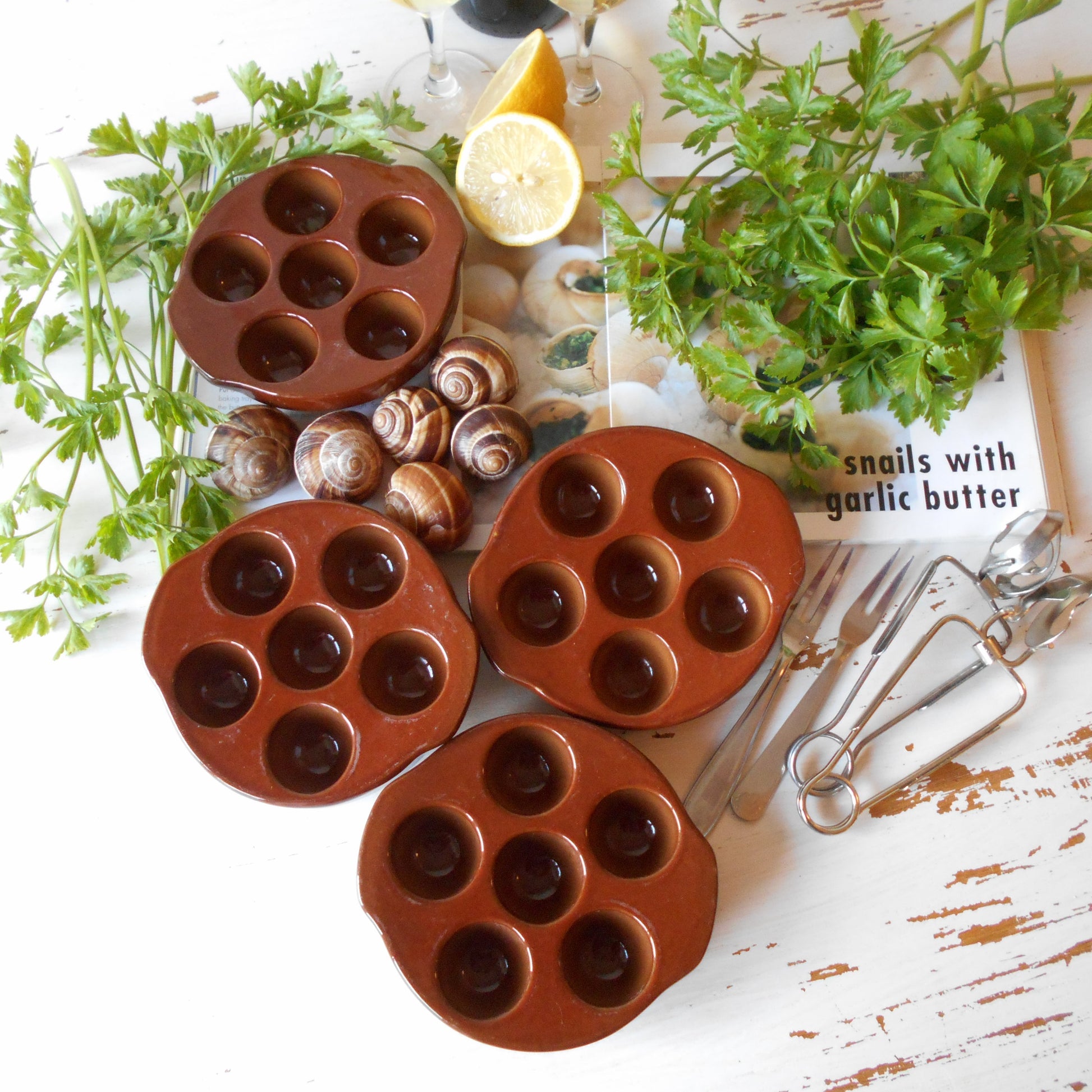 Four Escargot Cooking/Serving Dishes. from Tiggy & Pip - €80.00! Shop now at Tiggy and Pip