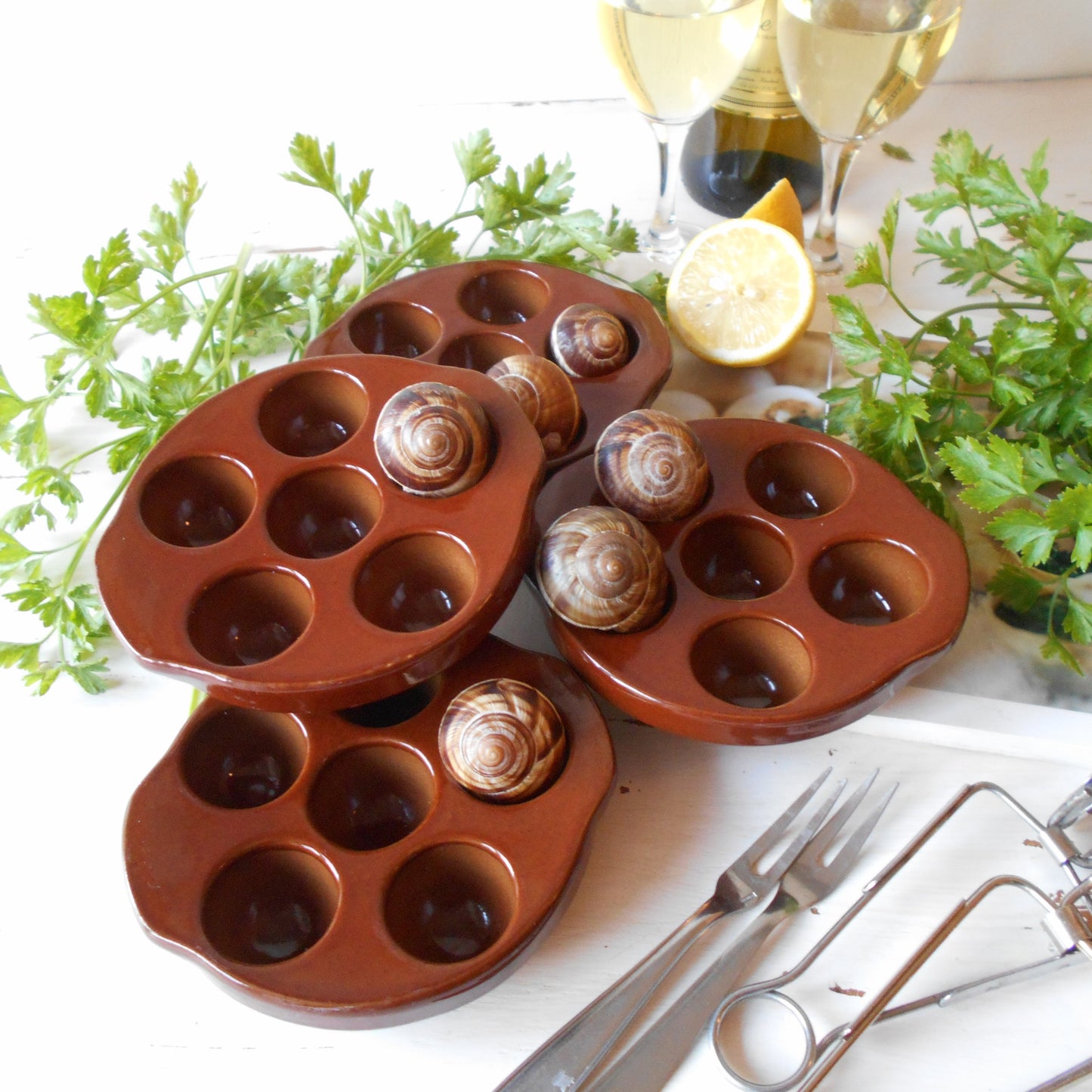 Four Escargot Cooking/Serving Dishes. from Tiggy & Pip - €80.00! Shop now at Tiggy and Pip